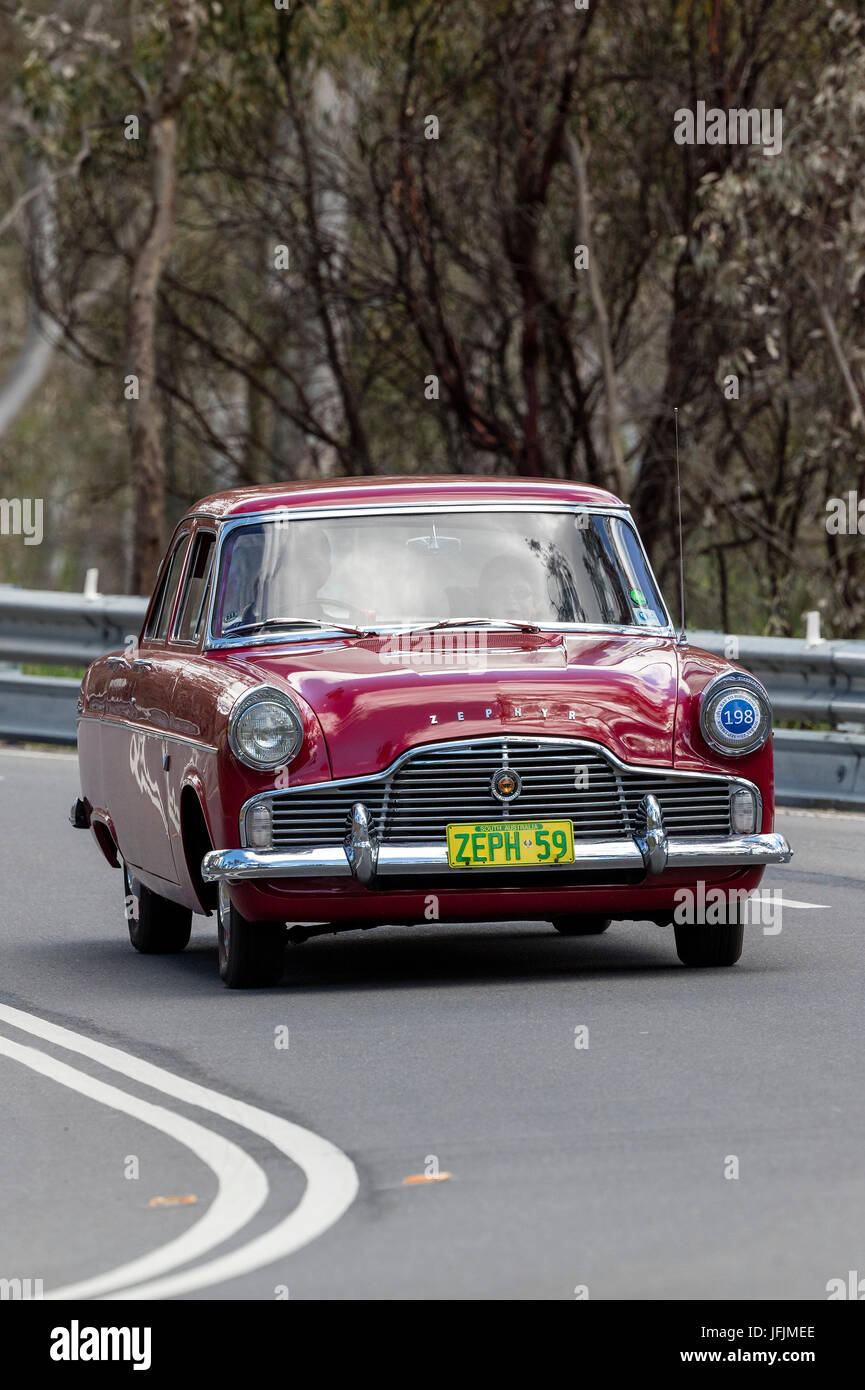 Vintage 1959 Ford Zephyr Sedan driving on country roads near the town of Birdwood, South Australia. Stock Photo