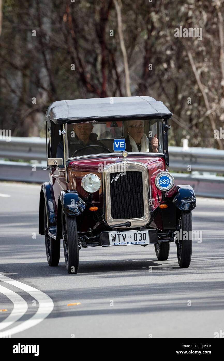 Vintage 1930 Austin 7 Chummy Tourer  driving on country roads near the town of Birdwood, South Australia. Stock Photo