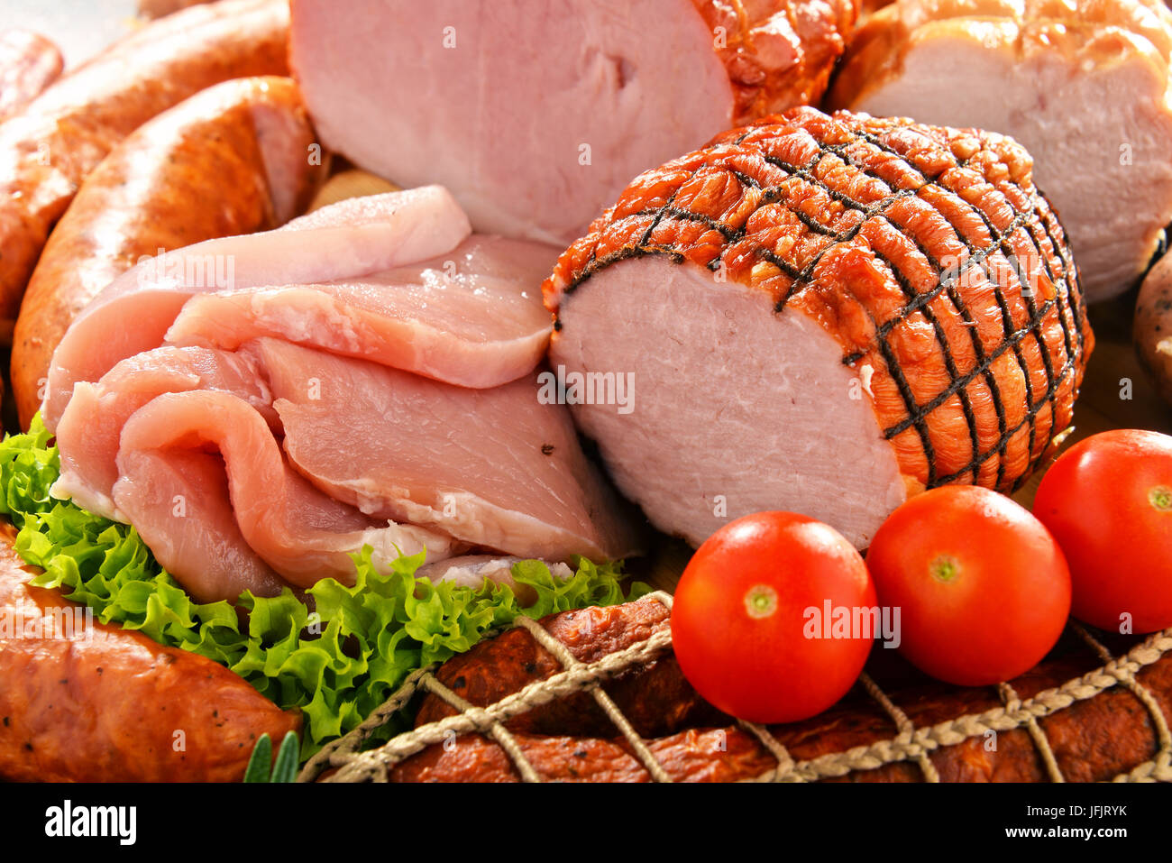 Assorted meat products including ham and sausages Stock Photo Alamy