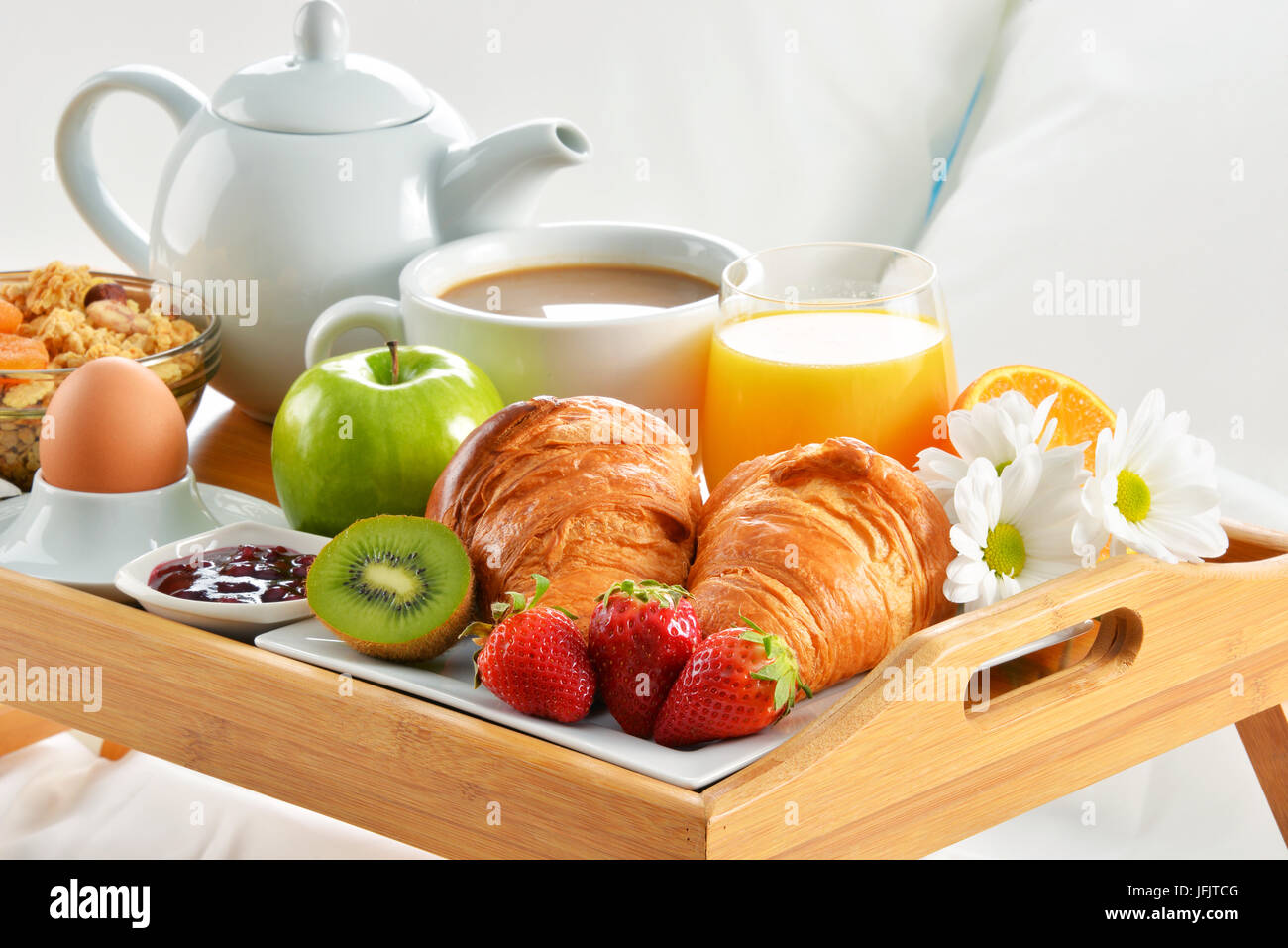 Breakfast tray in bed in hotel room Stock Photo - Alamy