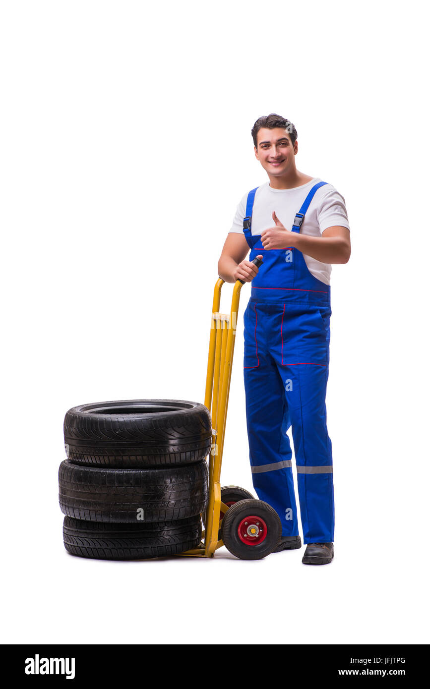 Tyre repairman with trolley isolated on white Stock Photo