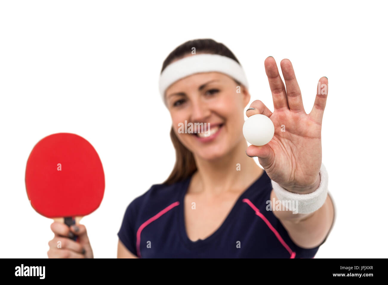 Female athlete holding table tennis paddle and ball Stock Photo Alamy