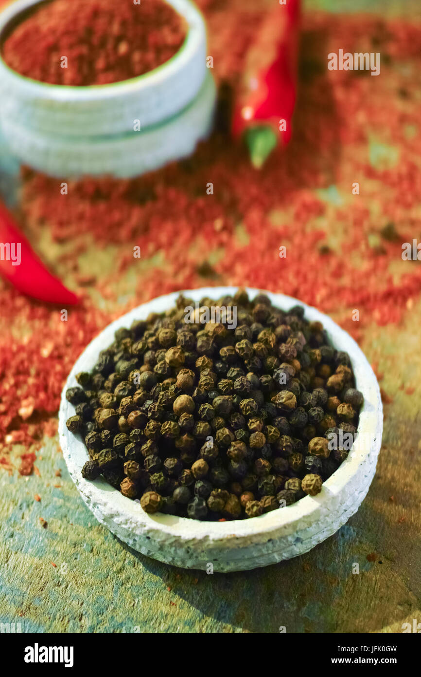 Black pepper and Red hot chili Cayenne fresh and dried powdered spice