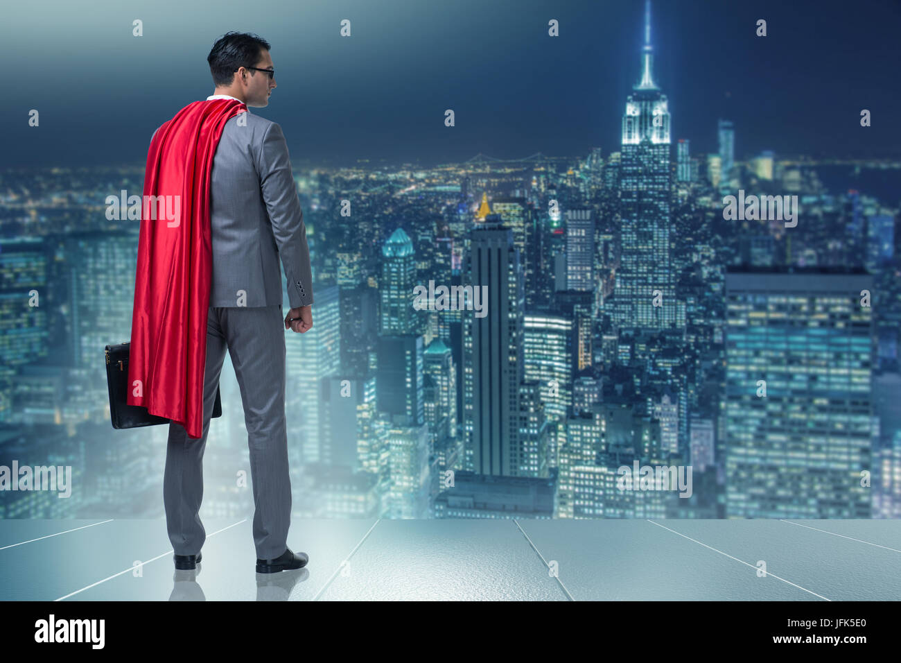 Businessman in superhero concept with red cover Stock Photo - Alamy