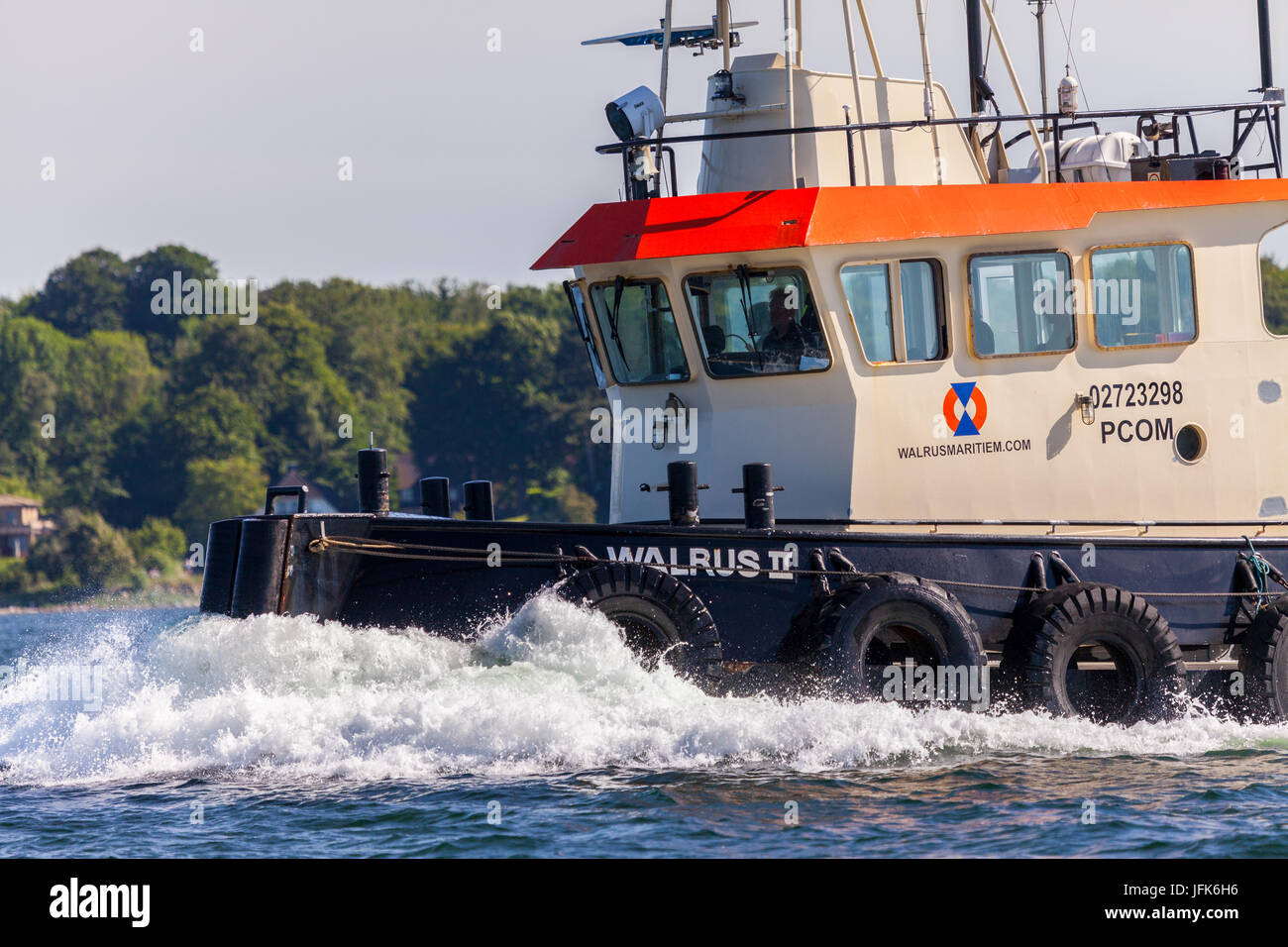 KIEL / GERMANY - JUNE 20, 2017: tug / pushboat from Walrus Maritiem drives through water on the public event Kieler Woche. Stock Photo