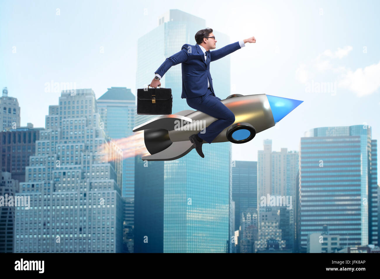 Businessman flying on rocket in business concept Stock Photo - Alamy