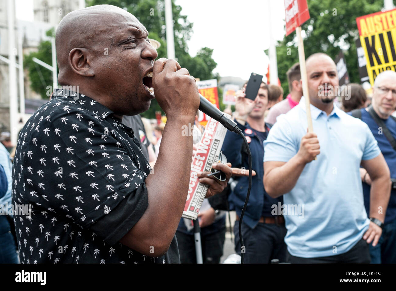 London, UK. 01st July, 2017. LONDON, ENGLAND - JULY 01 Demonstrators for Grenfell Tower joined the 'Not One Day More' rally in Parliement square. Thousands of protesters joined the anti-Tory demonstration at BBC Broadcasting House and marched to Parliament Square. The demonstrators were calling for an end to the Conservative Government and policies of austerity Credit: onebluelight.com/Alamy Live News Credit: onebluelight.com/Alamy Live News Stock Photo