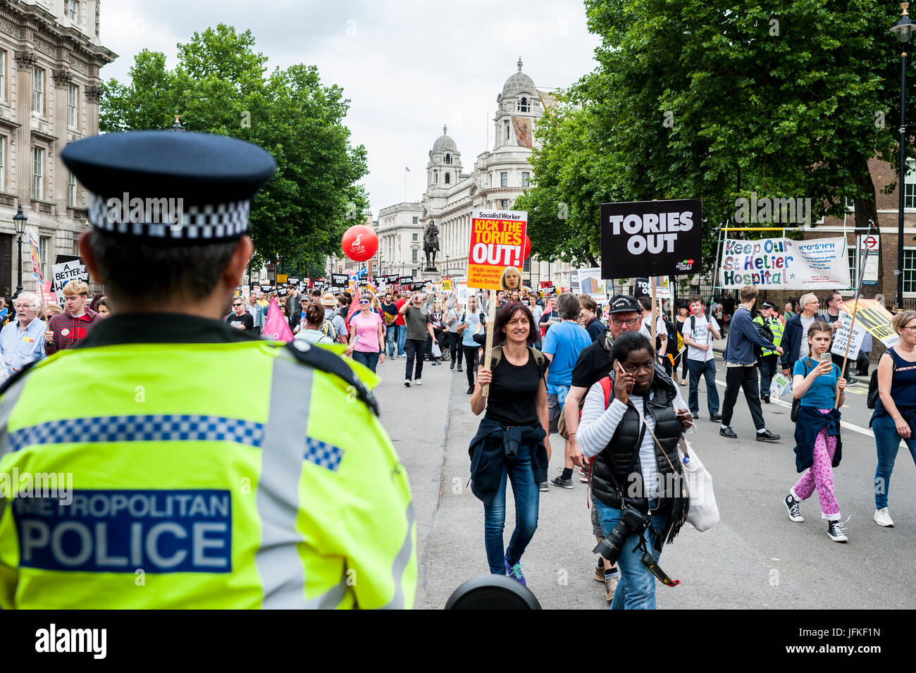 Carrying placard placards signs hi-res stock photography and images - Alamy