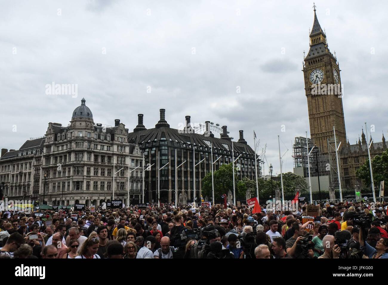 London, UK. 1st July, 2017. Thousands of protesters march through London and rally in Parliament calling for a change in government and an end to austerity. Credit: claire doherty/Alamy Live News Stock Photo