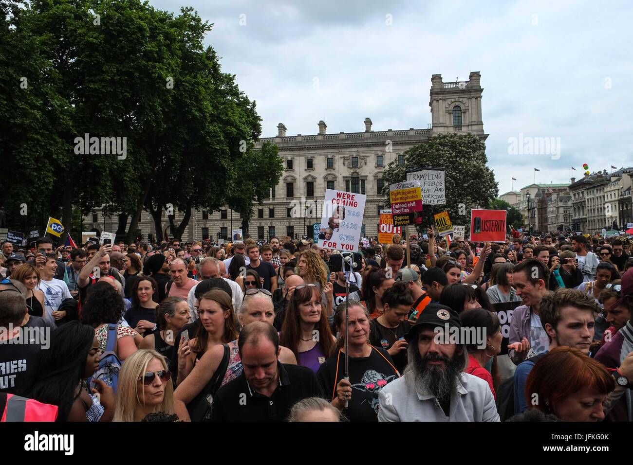 London, UK. 1st July, 2017. Thousands of protesters march through London and rally in Parliament calling for a change in government and an end to austerity. Credit: claire doherty/Alamy Live News Stock Photo