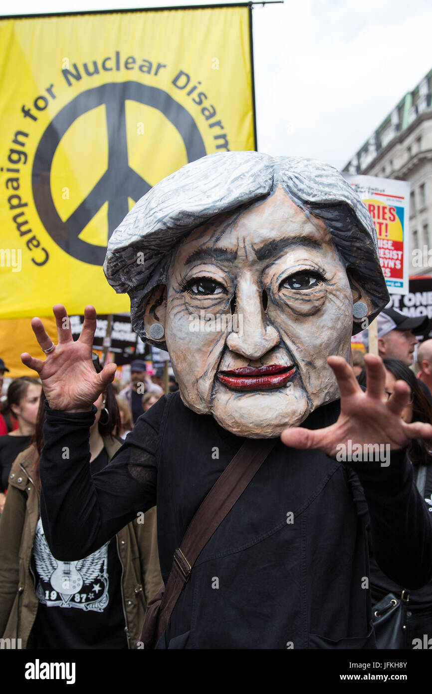 London, UK. 1st July, 2017. A protester wearing a Theresa May mask among thousands of people from many different campaign groups and trade unions marching on the Not One More Day national demonstration organised by the People's Assembly Against Austerity in protest against continuing austerity, cuts and privatisation and to call for a properly funded health service, education system and housing. A minute's silence was also held for the victims of the fire at Grenfell Tower. Credit: Mark Kerrison/Alamy Live News Stock Photo
