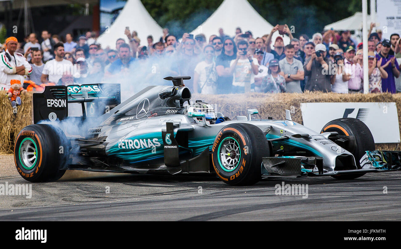 Goodwood, UK. 1st July, 2017.  Mercedes F1 Star Valtteri Bottas thrills the large crowd as he performs Donuts at the 2017 Goodwood Festival of Speed. Demonstrating his skill at handling the 2014 Championship Winning Mercedes-AMG Petronas Credit: David Betteridge/Alamy Live News Stock Photo