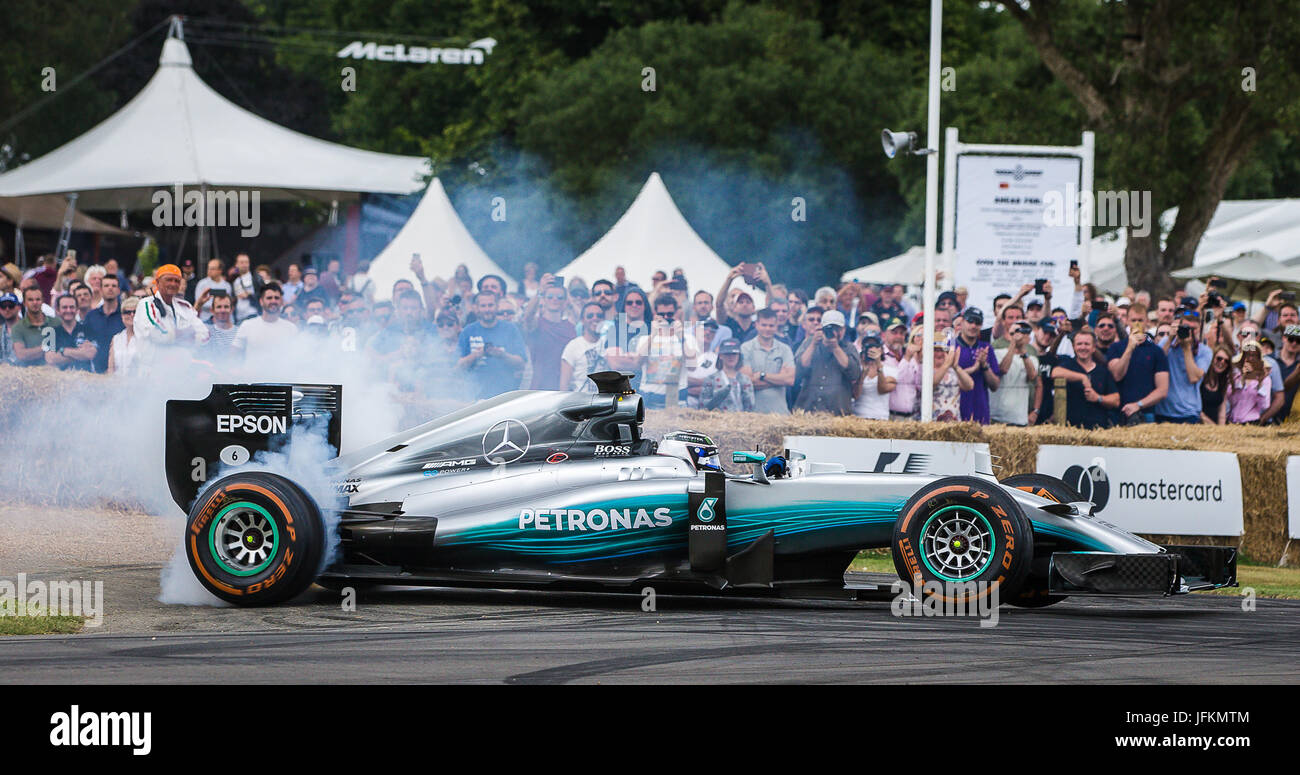 Goodwood, UK. 1st July, 2017.  Mercedes F1 Star Valtteri Bottas thrills the large crowd as he performs Donuts at the 2017 Goodwood Festival of Speed. Demonstrating his skill at handling the 2014 Championship Winning Mercedes-AMG Petronas Credit: David Betteridge/Alamy Live News Stock Photo