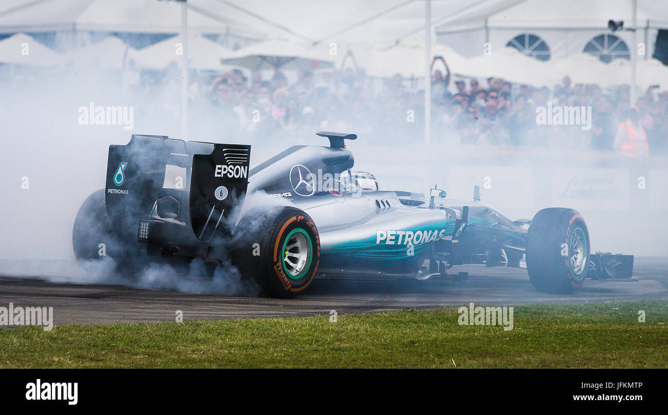 Goodwood, UK. 1st July, 2017.  Mercedes F1 Star Valtteri Bottas thrills the large crowd as he performs Donuts at the 2017 Goodwood Festival of Speed. Demonstrating his skill at handling the 2014 Championship Winning Mercedes-AMG Petronas Credit: David Betteridge/Alamy Live News Stock Photo