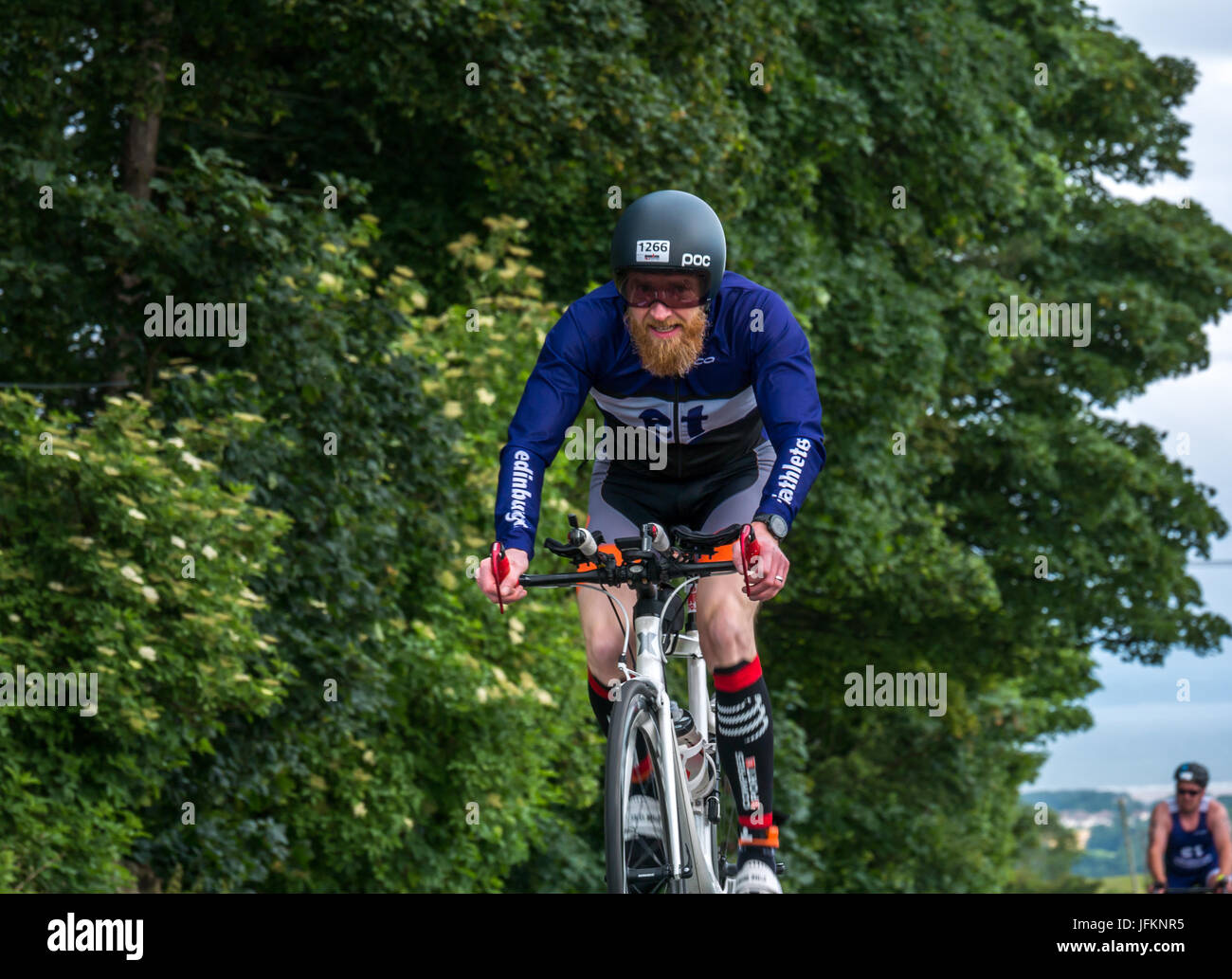 Byres Hill, East Lothian, Scotland, United Kingdom, 2nd July 2017. A cyclist in the cycling event in Edinburgh Ironman 70.3 at Byres Hill, East Lothian, Scotland, UK Stock Photo