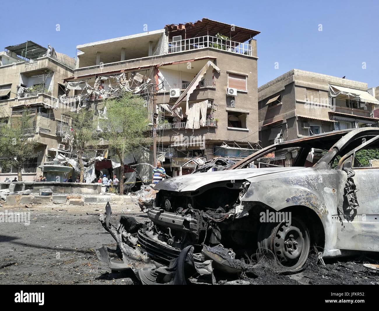 Damascus, Syria. 2nd July, 2017. A damaged car is seen at the Tahrir
