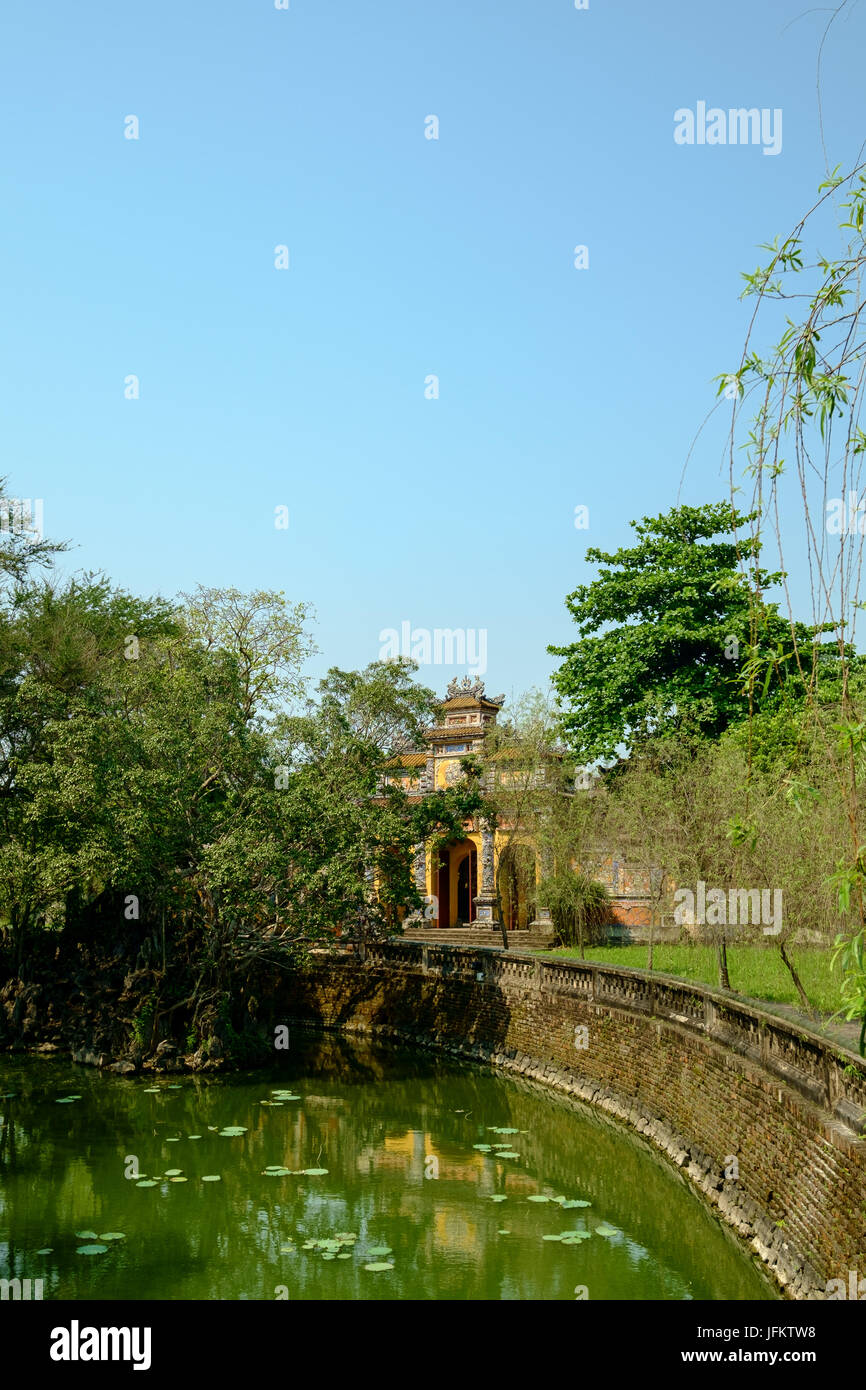 Marble building, bridge and lake in the grounds of The Citadel, Hue, Vietnam Stock Photo
