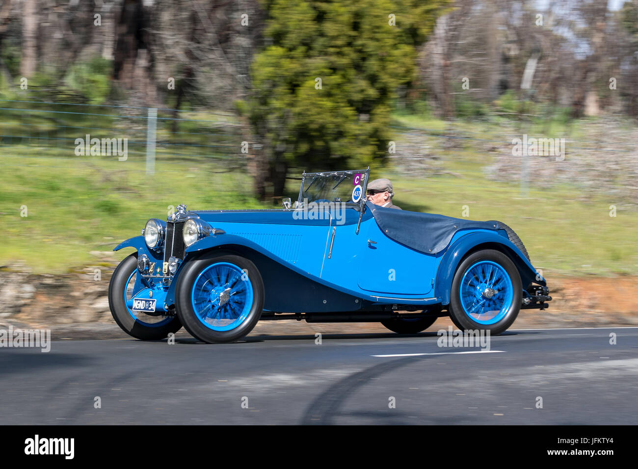 Vintage 1934 MG ND Roadster  driving on country roads near the town of Birdwood, South Australia. Stock Photo