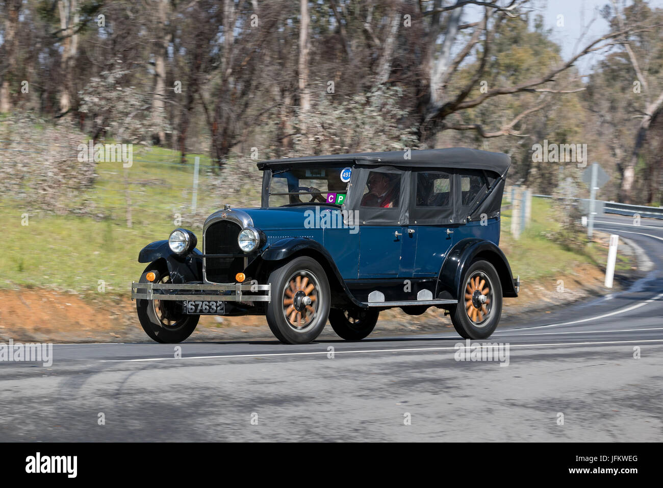 Vintage 1926 Chrysler H Tourer driving on country roads near the town of Birdwood, South Australia. Stock Photo