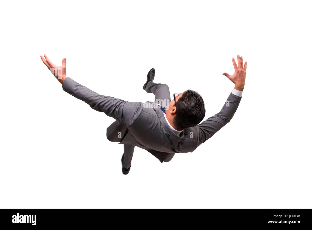 Falling businessman isolated on the white background Stock Photo Alamy
