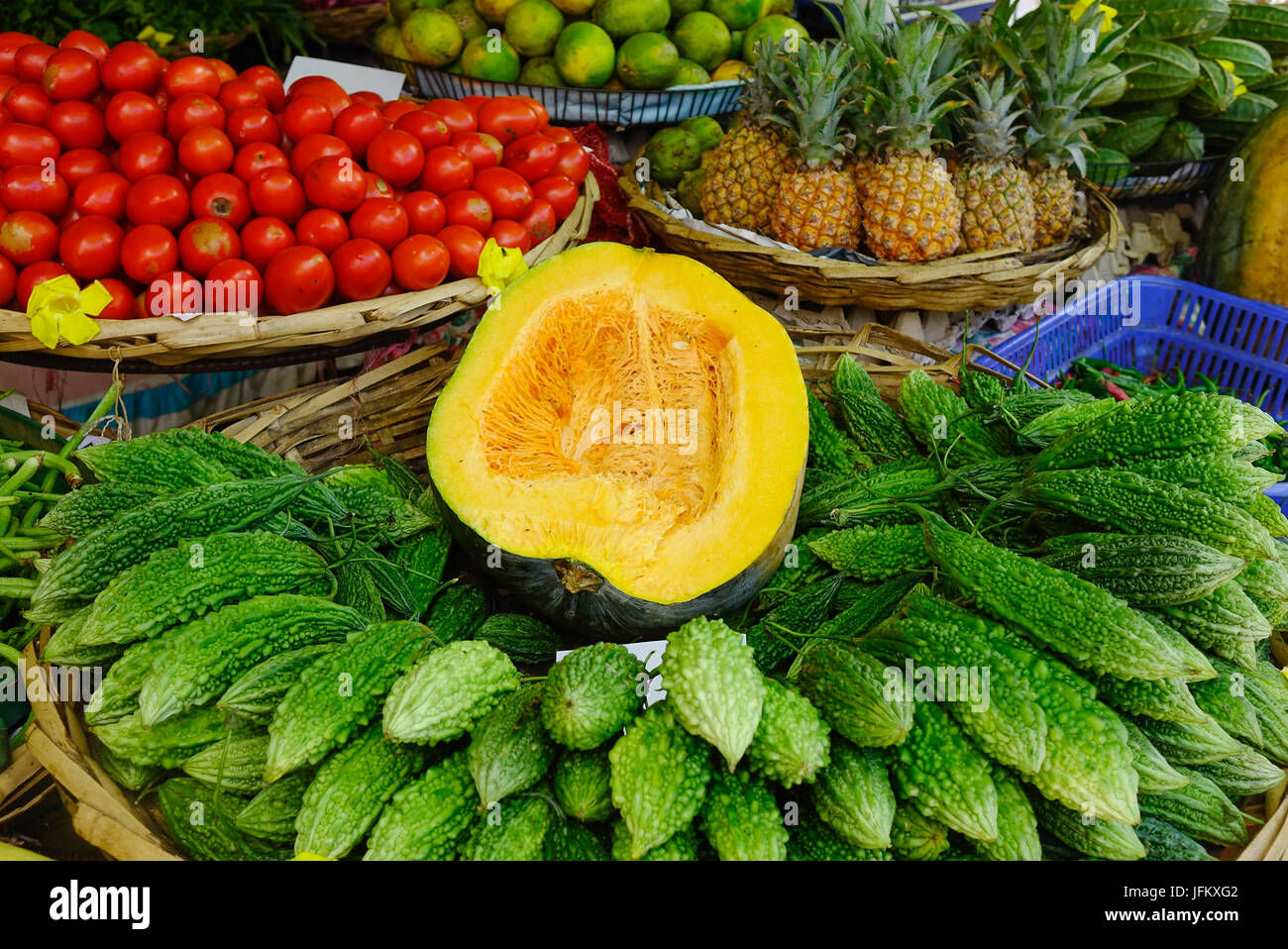 Selling fruits and vegetables at a local market in Mahebourg, Mauritius