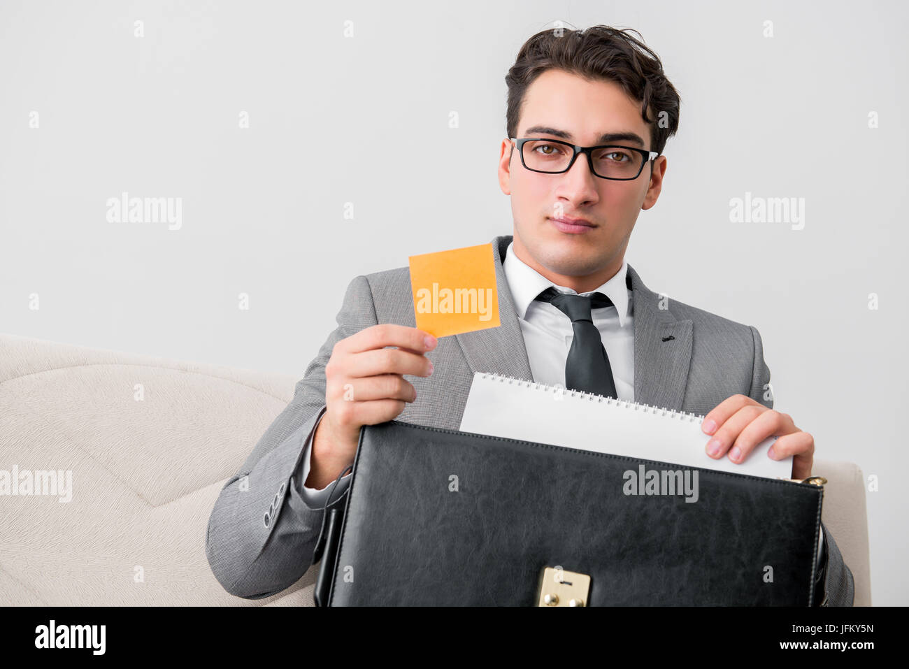 Businessman with briefcase in business concept Stock Photo
