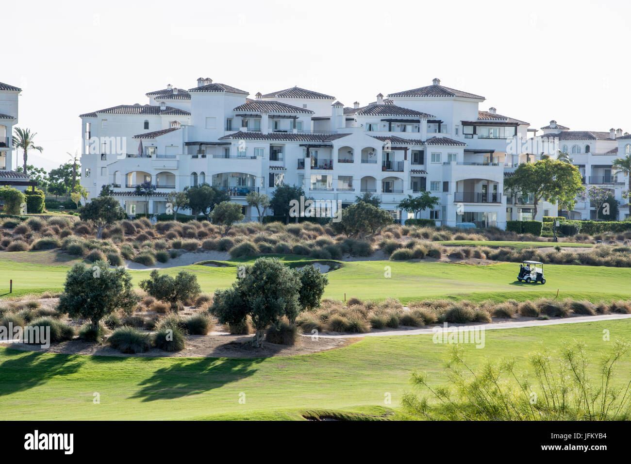 Golf buggy on the fairway at Hacienda Riquelme Golf Resort in Murcia Spain Stock Photo