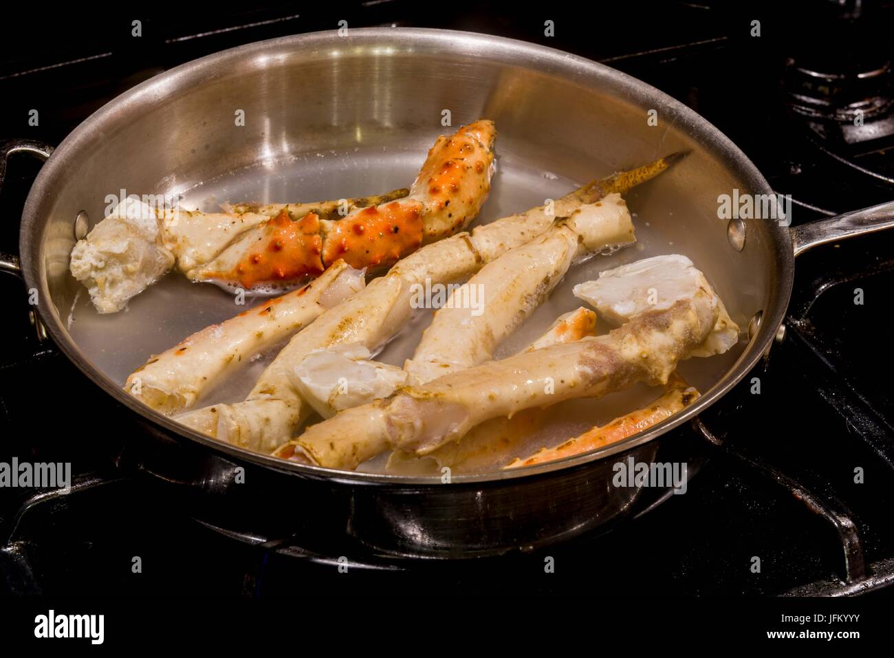 Crab legs being cooked Stock Photo Alamy