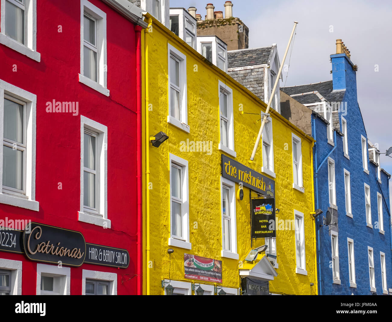Close up of colourful buildings on seafront, Tobermory, Isle of Mull, Inner Hebrides, Scotland, Uk Stock Photo