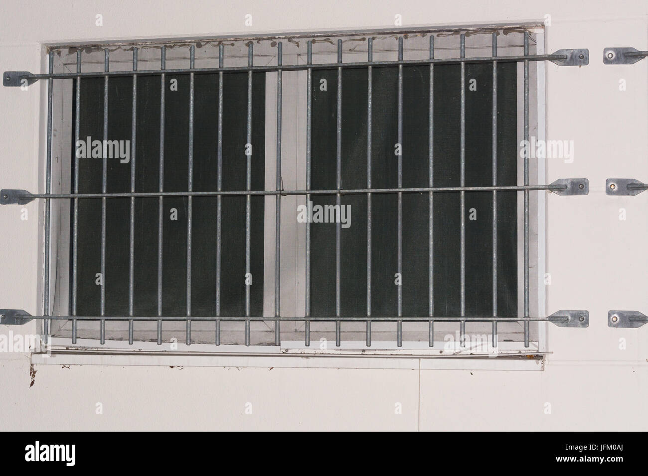 Security grille for windows and doors as protection against intruders. Stock Photo