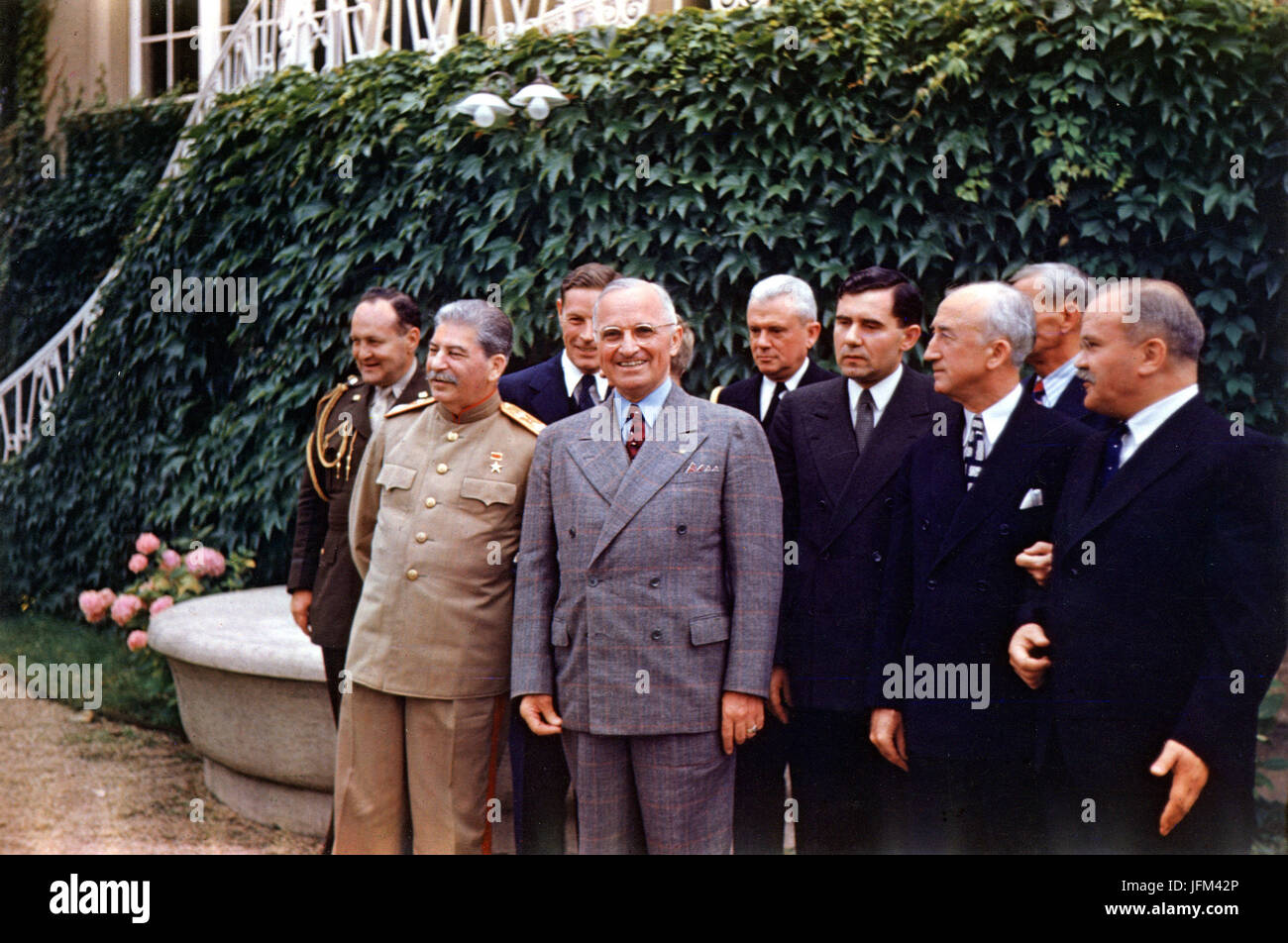 United States President Harry S. Truman (center) and Russia's Joseph Stalin meet at Potsdam. Left to Right, Row 1: Stalin, Truman, Soviet Ambassador Andrei Gromyko, Secretary of State James Byrnes, and Stock Photo