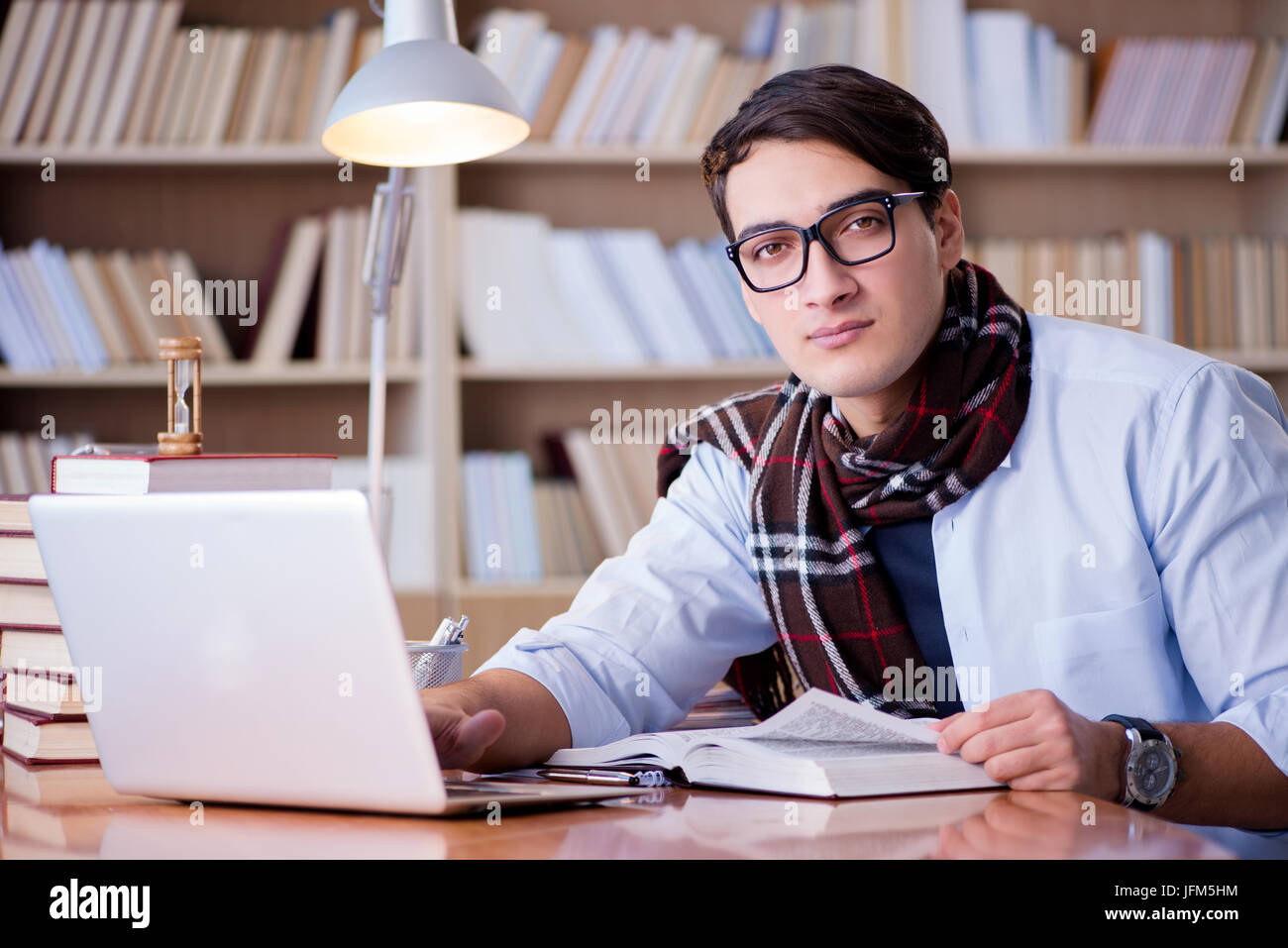 Writer In Library Young writer working in the library Stock Photo - Alamy