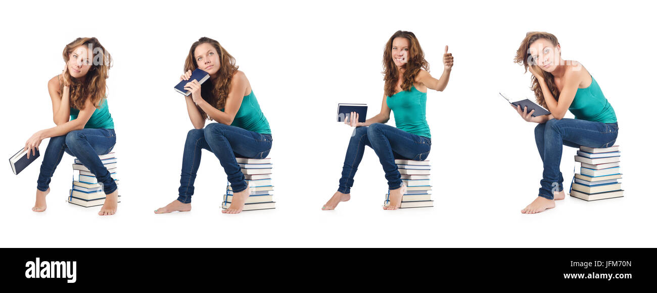 Student sitting on stack of books Stock Photo - Alamy