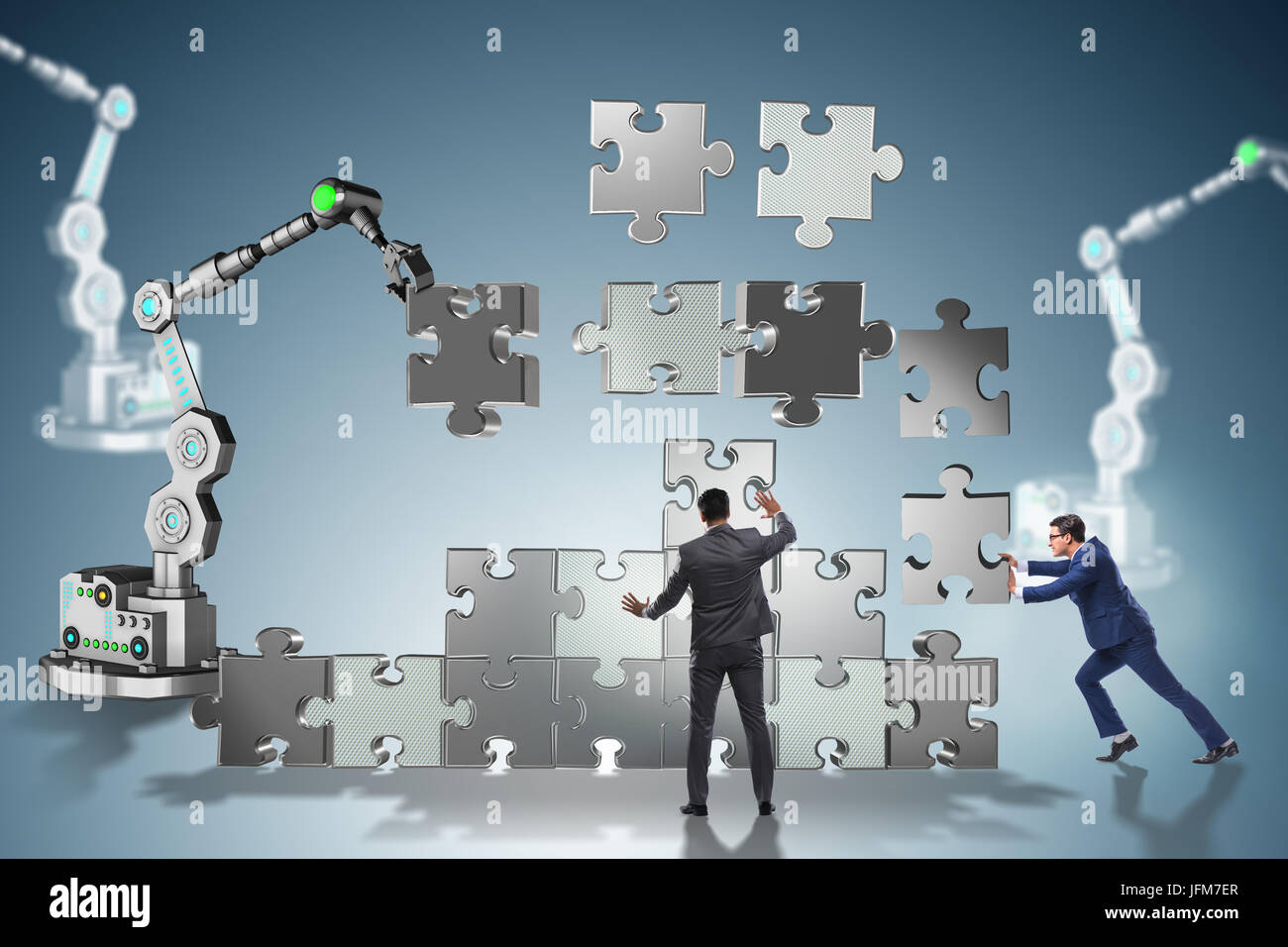 Businessman doing jigsaw puzzle with robotic arm Stock Photo - Alamy