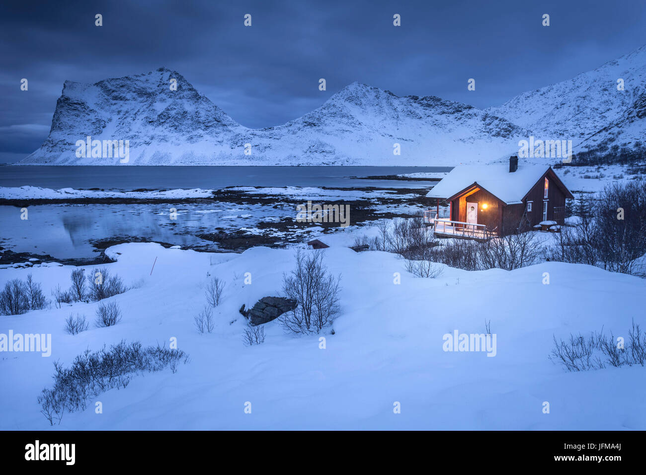 Solitary house at Haukland beach, Lofoten Island, Norway Stock Photo