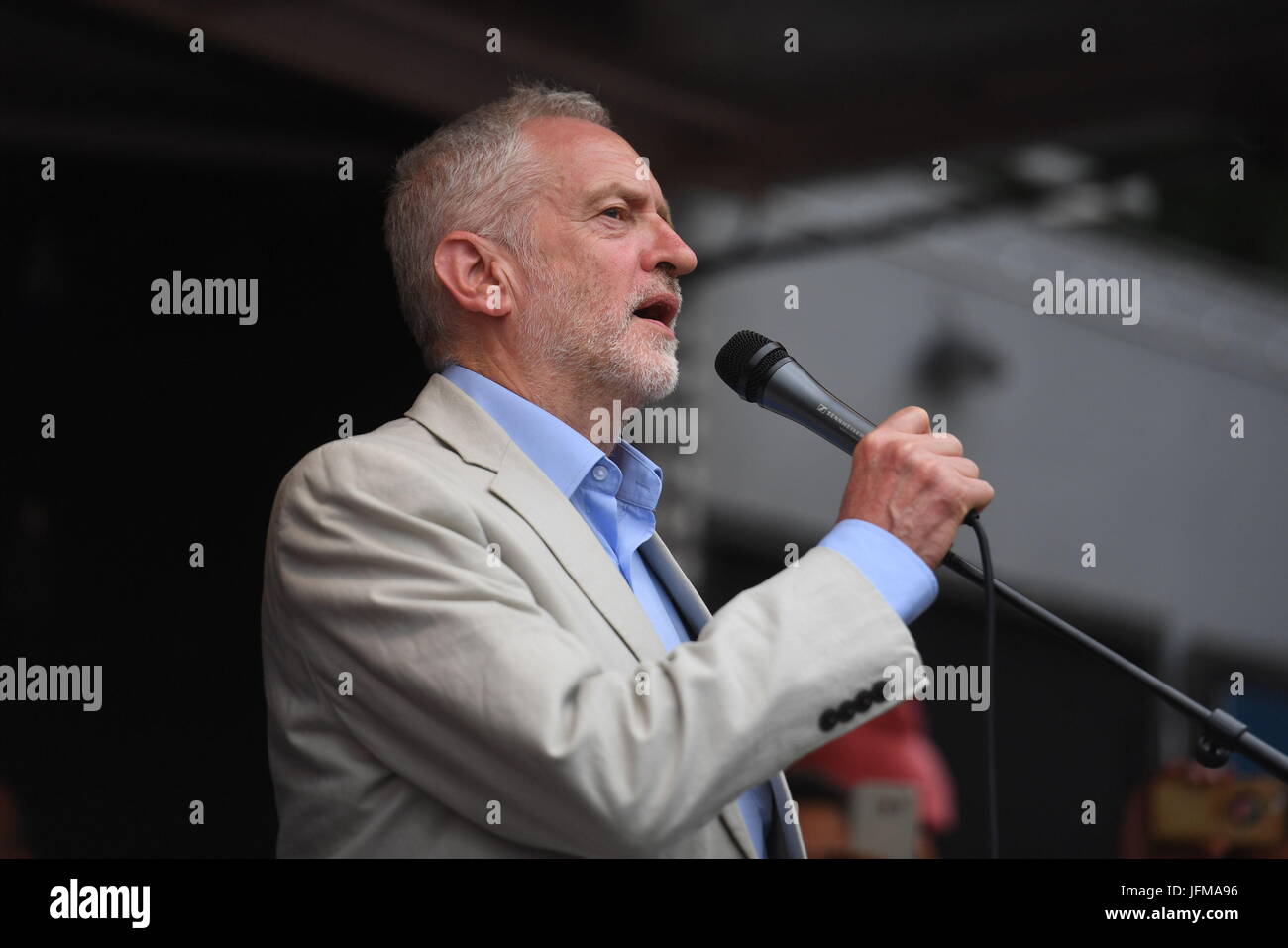 Labour leader Jeremy Corbyn addresses an anti-austerity rally in Parliament Square, London, after a march through the city as part of an anti-austerity protest. Stock Photo