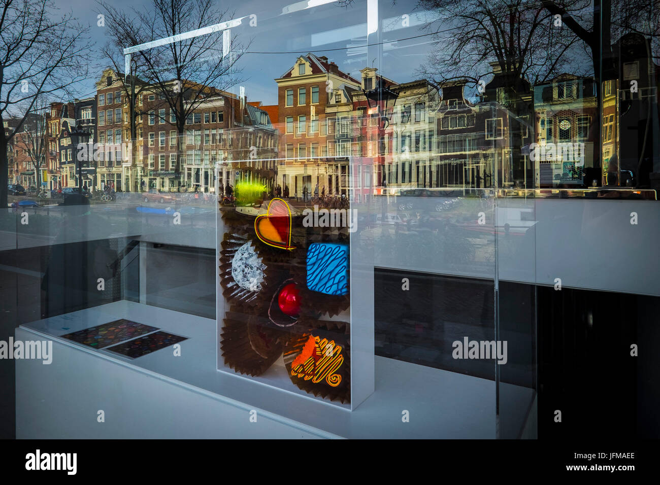 Amsterdam, Netherlands, Europe, Traditional houses reflected in the shop, Stock Photo