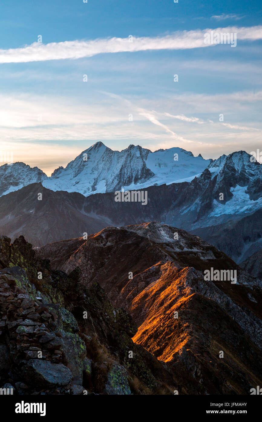 The sunrise lights painting the elegant profiles of the Tonale mount Tonale mount, Lombardy, Italy, Europe Stock Photo