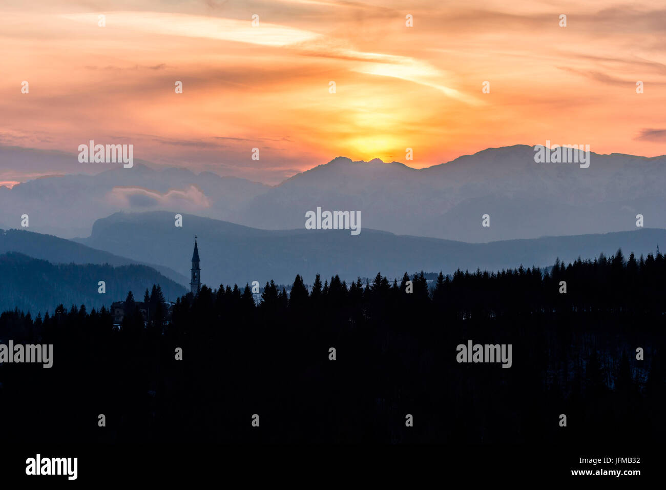 Roana, Altopiano of Asiago, Province of Vicenza, Veneto, Italy, Steeple of Roana Church at sunset, Stock Photo