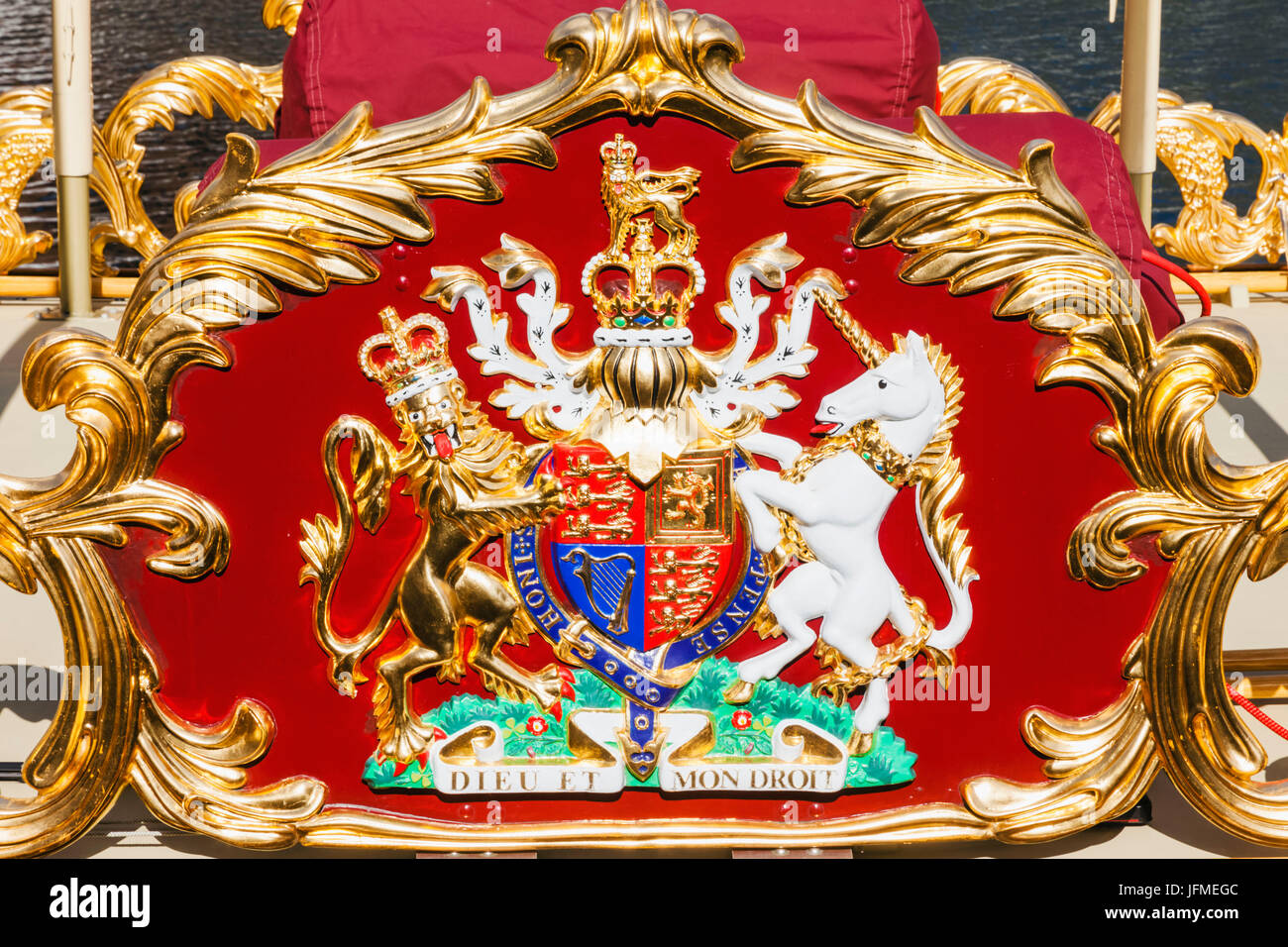 England, London, Wapping, St.Katharine Docks, Detail of Royal Coat of Arms on The Queen's Rowbarge Gloriana Stock Photo