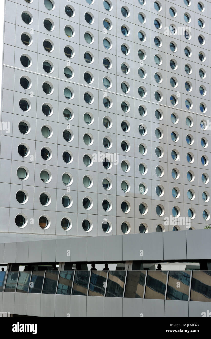 China, Hong Kong, Central District, Connaught Place, The Jardine House built in 1973 by P and T Architects and Engineers Ltd Stock Photo