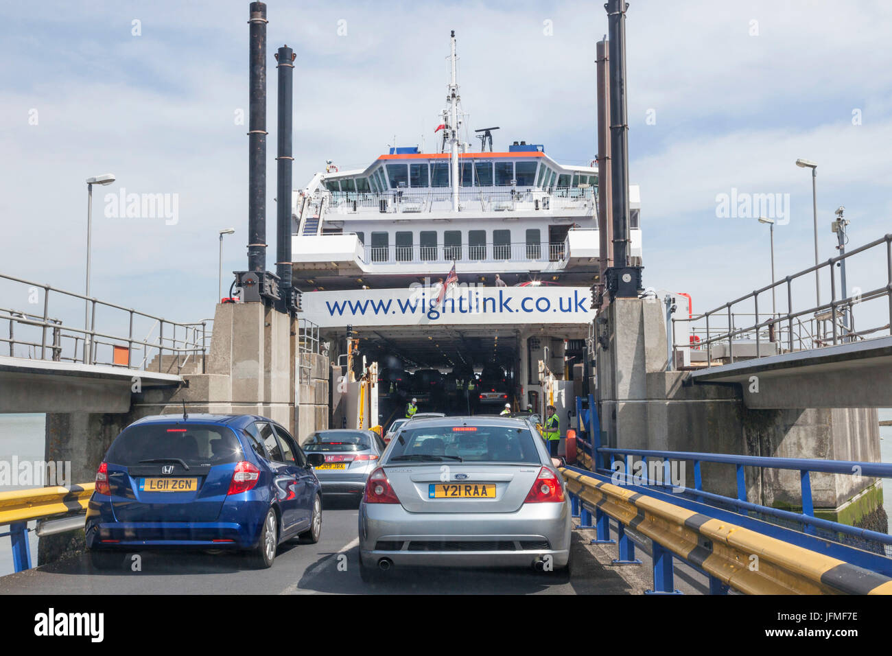 England, Hampshire, Isle of Wight, Fishbourne, Cars Entering Wightlink Ferry Stock Photo
