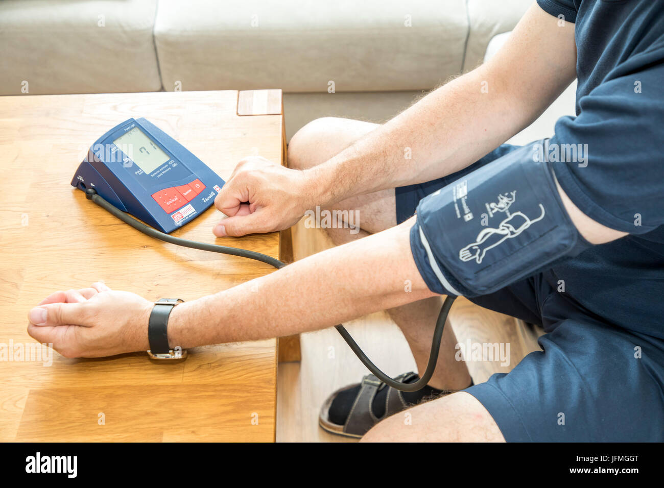 Blood pressure measurement hi-res stock photography and images - Alamy