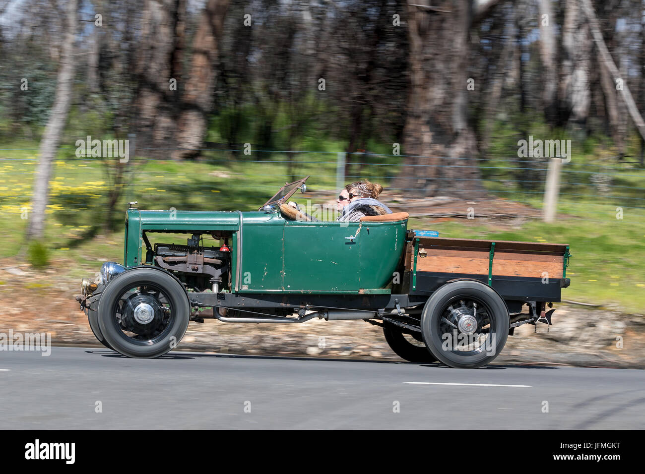Vintage 1930 Chevrolet Capitol Buckboard driving on country roads near the town of Birdwood, South Australia. Stock Photo