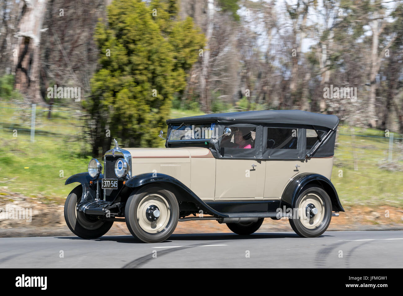 Vintage 1929 Chevrolet Sedan Tourer driving on country roads near the town of Birdwood, South Australia. Stock Photo