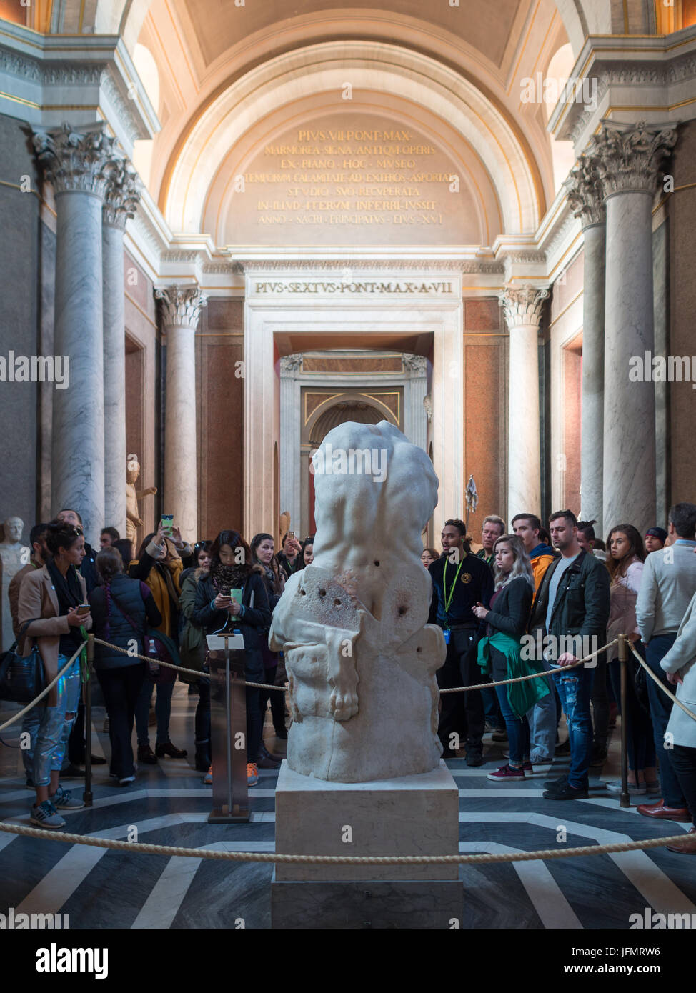 Vatican Museum visitors admiring a statue Stock Photo