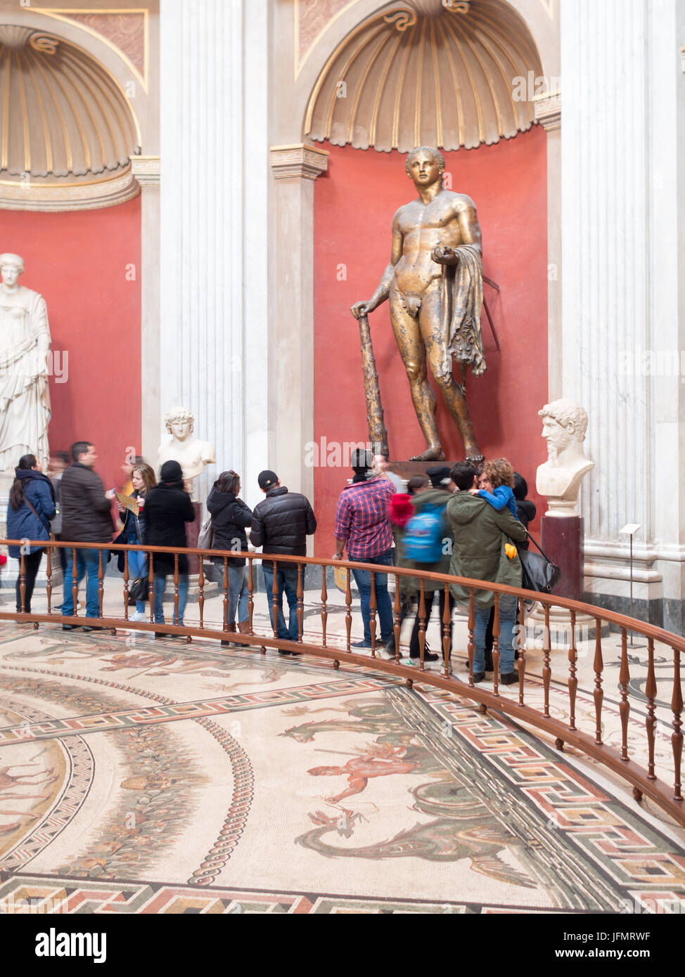 Visitors to the Vatican Museum admiring the art works Stock Photo