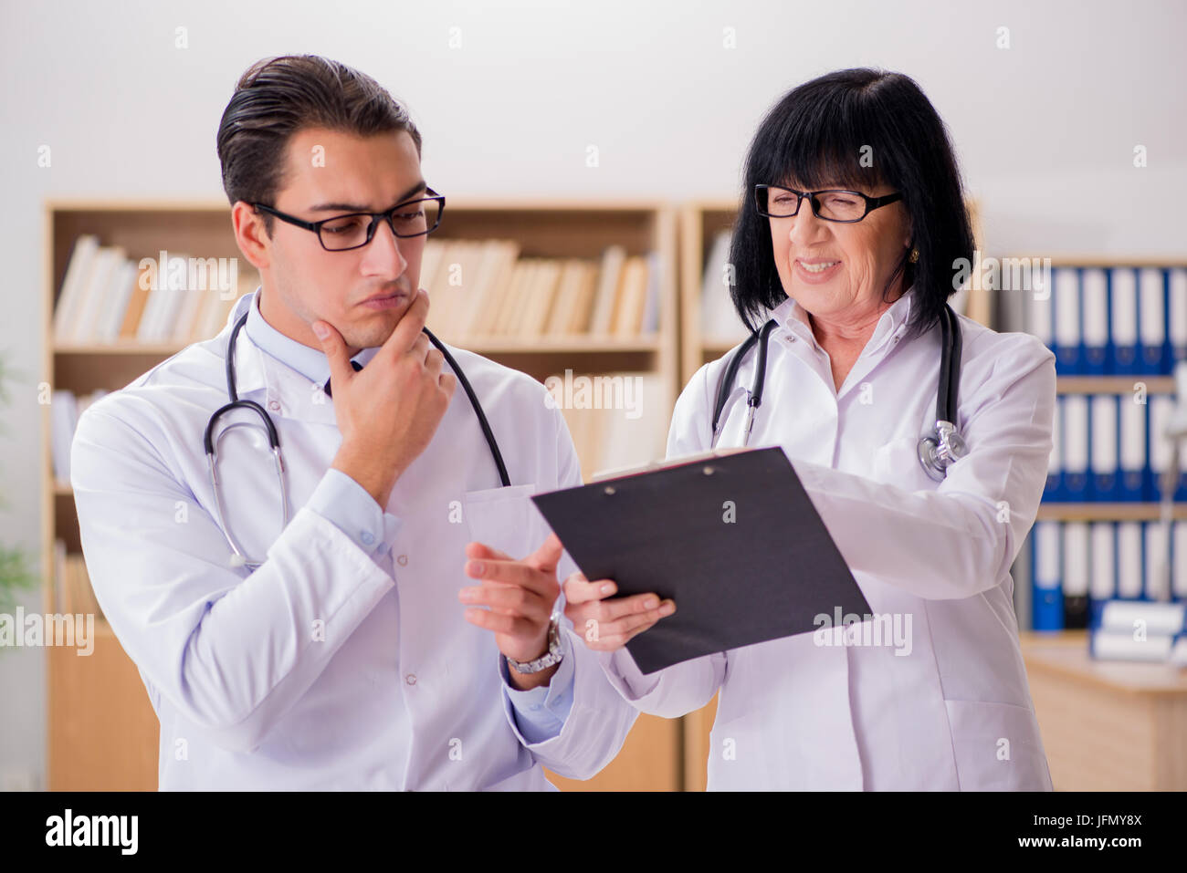 The two doctors working in the lab Stock Photo - Alamy