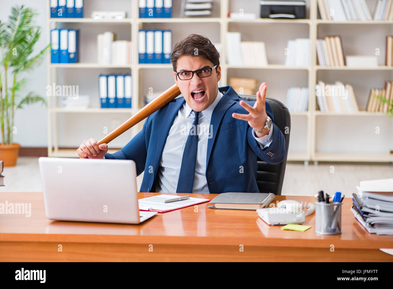 The angry aggressive businessman in the office Stock Photo - Alamy