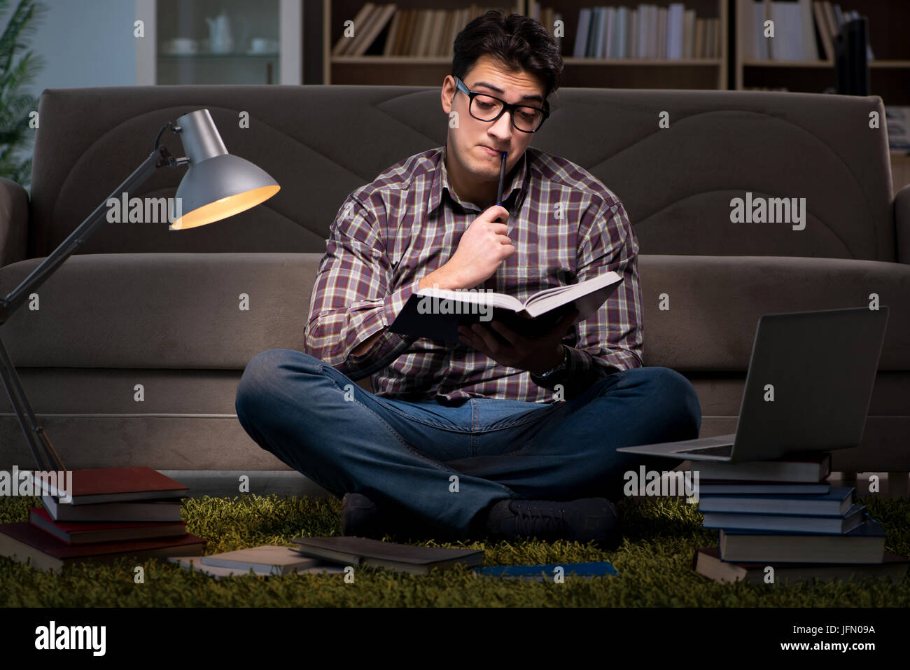 The student reading books preparing for exams Stock Photo